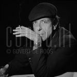 11-12-1985 Leonard Cohen in Rotterdam, The Netherlands. December 11, 1985.

[keywords]Posed, Headshot, Eye contact, Black & White image, Smoking[/keywords]